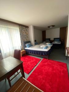 Cama o camas de una habitación en Hotel Regina