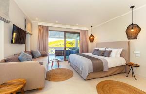 Postel nebo postele na pokoji v ubytování Bella Mare Hotel