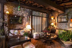 a living room with a couch and a table at Apartamento Sueve 24 in Colunga