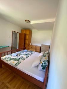 a bedroom with a bed in a room at Apartments TEA in Trebinje