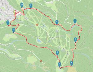 a map of a trail with red routes at Aux pieds des pistes 4/6 personnes in Gérardmer