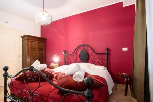 A bed or beds in a room at Colosseum B