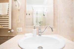A bathroom at Colosseum B