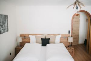 Postel nebo postele na pokoji v ubytování Gästehaus Sonnenplatzerl