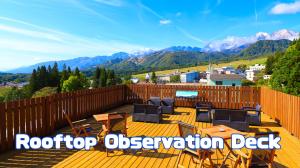 una terraza de observación en la azotea con vistas a las montañas en Apprising hotels GranJam Tsugaike, en Otari