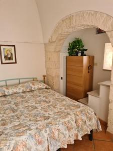 Lova arba lovos apgyvendinimo įstaigoje La casetta di Antonella