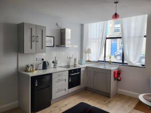 Küche/Küchenzeile in der Unterkunft 360 Town Stay Apartments & Studios