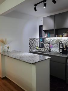 a kitchen with a counter top and a sink at Executive homes in Nairobi