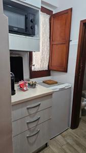 Kuchnia lub aneks kuchenny w obiekcie La Casarella