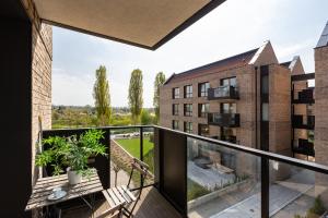 Balkón alebo terasa v ubytovaní Palm Aparts Gdańsk