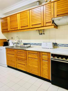 Kuchyň nebo kuchyňský kout v ubytování Sesimbra Flat