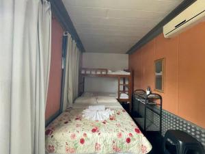 Postel nebo postele na pokoji v ubytování Pousada de Containers