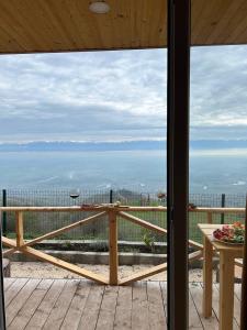 a view of the ocean from the porch of a house at Arkhilo's cottage in Dedoplis Tskaro