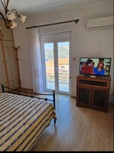Postel nebo postele na pokoji v ubytování Chrysafos view