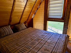 Postel nebo postele na pokoji v ubytování Vlasic Odmor - Villa Krajina V