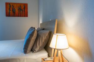 Postel nebo postele na pokoji v ubytování Casa Candia
