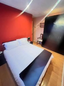 Lova arba lovos apgyvendinimo įstaigoje Inviting 2-Bed House in London