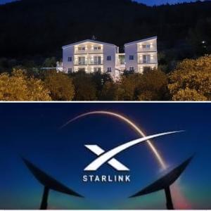 a picture of a starlink sign in front of a building at Harmony Thassos suites & Apartments in Skala Rachoniou