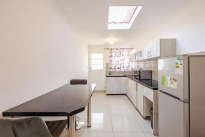 A kitchen or kitchenette at One bedroom apartment.