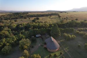 an aerial view of a barn in a field at Soetgeluk Farm Cottage in Hekpoort
