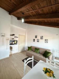 a living room with a couch and a table at Js House Shkoder 2 in Shkodër