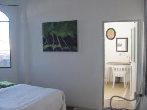 Giường trong phòng chung tại Romantisches casa limone