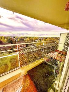 a balcony with a bench and a view at 120m² Atomium,Brussels Expo,StadeRoiBaudoin,Cinéma in Brussels