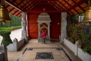 Zahrada ubytování Poojaris Nirantara - Mysuru