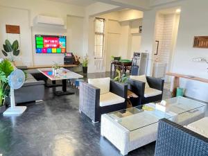 TV o dispositivi per l'intrattenimento presso 阿郎衝浪旅店A-lang Surfing House