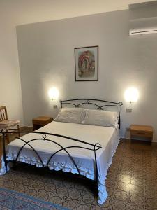Ένα ή περισσότερα κρεβάτια σε δωμάτιο στο Casa Beatrice