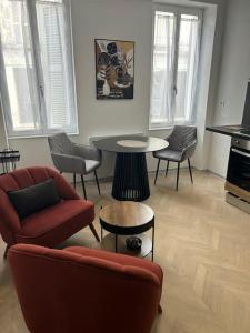 Area tempat duduk di Appartement SPA 2 pers-Couteliers-Centre ville