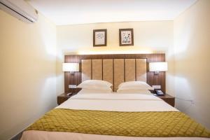 Krevet ili kreveti u jedinici u okviru objekta Jogor Hotel Ibadan