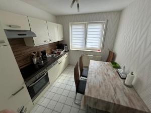 Kuchyň nebo kuchyňský kout v ubytování Ferienwohnung 24A Unten Links 3 Zimmer