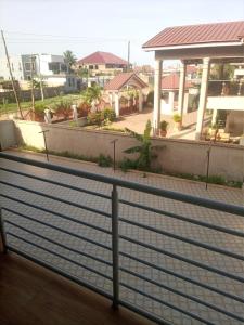 a view from the balcony of a building at 2 bedroom apartment in Tema