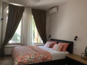 Кровать или кровати в номере Apartments Dunja