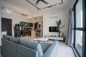 TV a/nebo společenská místnost v ubytování Seaview Urban suites Georgetown @Penang