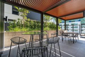 Rõdu või terrass majutusasutuses North-Facing APT 3 min to Canberra Times Fountain - Hosted by CanStay