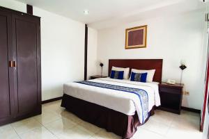 Letto o letti in una camera di Dago Highland Resort