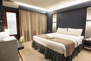 Letto o letti in una camera di Dago Highland Resort