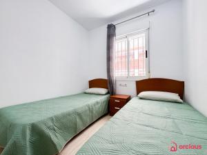 Postel nebo postele na pokoji v ubytování La Elegancia