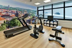 a gym with a view of a city at NH Erlangen in Erlangen