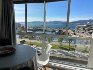 a large window with a view of the water at Centro VIGO.NUEVO.TOP BEST VIEWS in Vigo