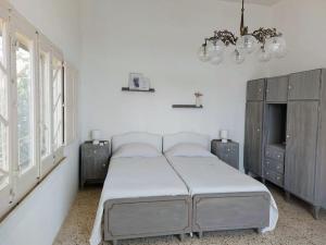 Postel nebo postele na pokoji v ubytování Wilga Summit Apartment B