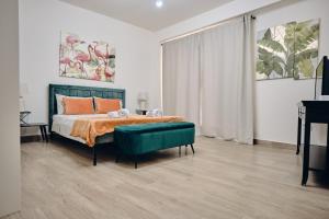 Postel nebo postele na pokoji v ubytování CORTILIO Luxury Homes on Etna