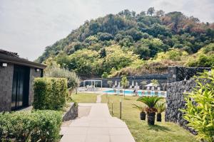 a view of the pool from the house at CORTILIO Luxury Homes on Etna in Giarre