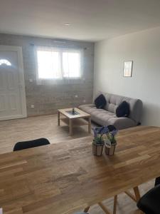 Posezení v ubytování Appartement - location saisonnière