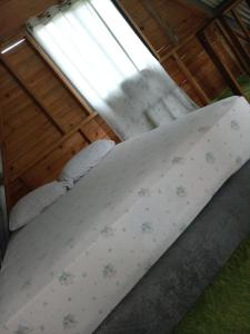 Posteľ alebo postele v izbe v ubytovaní Hostal claire