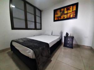 Postel nebo postele na pokoji v ubytování Apartamento 202 Riosucio