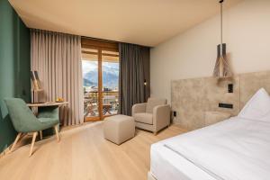 Postel nebo postele na pokoji v ubytování Hotel Therme Meran - Terme Merano