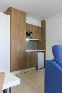Η κουζίνα ή μικρή κουζίνα στο Acacias Apartamentos Salou